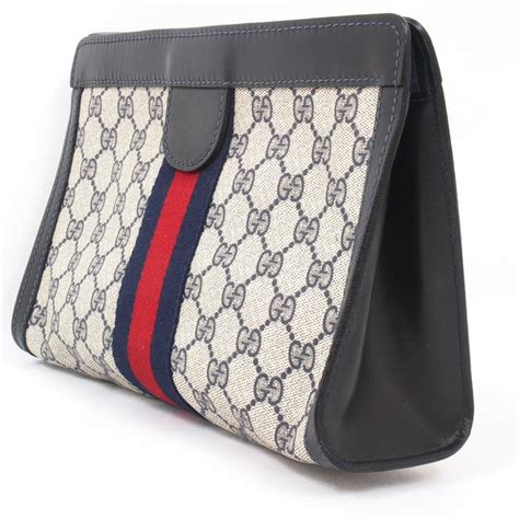 large gucci blue monogram envelope clutch|More.